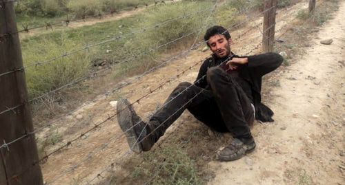 A man who tried to illegally cross a border with Iran. Photo by the press service of the State Border Guard Service of Azerbaijan http://dsx.gov.az/xeber/897