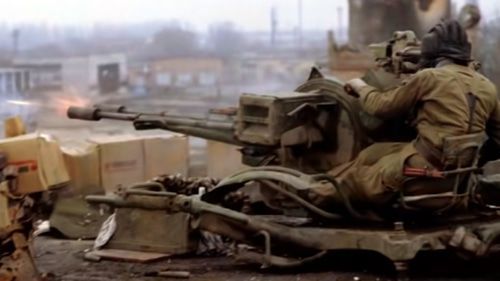 Hostilities in Grozny. Screenshot of the video "It was hell on earth: memories on the first Chechen war" by Radio Svoboda channel https://www.youtube.com/watch?v=BHjbaZIEosY