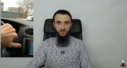 Tumso Abdurakhmanov shows a video posted by Islam Nukhanov. Screenshot of the video on Abdurakhmanov's YouTube channel https://www.youtube.com/channel/UCgggK05bEJ1BAQ2NTUn4igA