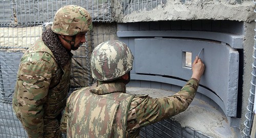 Azerbaijani soldiers. Photo by the press service of the Ministry of Defence of Azerbaijan https://mod.gov.az/az/news/mudafie-naziri-dunya-azerbaycanlilarinin-hemreyliyi-gununu-cebhede-xidmet-eden-herbi-qulluqcularla-qeyd-edib-video-29714.html