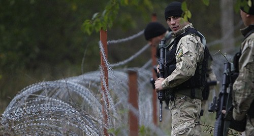 Georgian border guards. Photo: REUTERS/David Mdzinarishvili