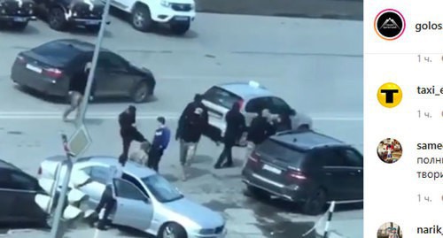 People in police uniform kicked a man. Screenshot of the video posted on Instagram "Голос Дагестана" https://www.instagram.com/p/B-kj2lQouDl/