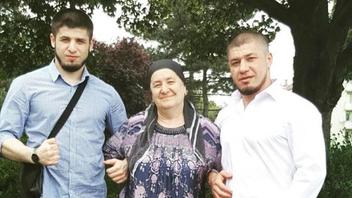 Murad Aslamkhanov (right) with his mother and brother. Photo courtesy of Murad Aslamkhanov's relatives.