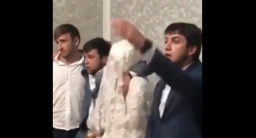 Screenshot from a video shooting where a resident of Dagestan behaved insultingly towards his own bride: https://vk.com/wall-74219800_766567?reply=769430