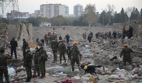 Rescuers clearing debris after shelling attack on Ganja, October 17, 2020. Photo by Aziz Karimov for the Caucasian Knot