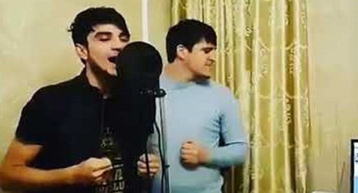 The brothers Ayub and Askhab Vakharagov. Screenshot of a video posted on the the channel "Ayub Vakharagov Official Music", https://www.youtube.com/watch?v=QyXyGKM3wPY