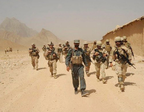 Georgian soldiers secure a village in the Helmand province, Afghanistan. 2010. http://en.wikipedia.org