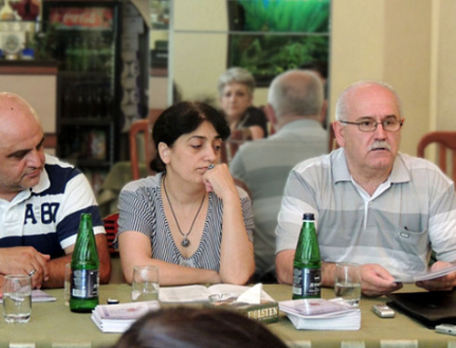 Participants of the project "Strengthening of Women's Capacity for Building Peace in Southern Caucasus" completed by the human rights organization "Centre of Civil Initiatives" in Nagorno-Karabakh. From left to right: the head of the Stepanakert rehabilitation center Vardan Tadevosyan; the chief of the target group in Shushi Anait Tovmasyan;
the head of the "Centre of Civil Initiatives" Albert Voskanyan. Nagorno-Karabakh, Stepanakert, June 29, 2013. Photo by Marta Altunyan, http://www.kavkaz-uzel.ru/blogs/929/posts/15113