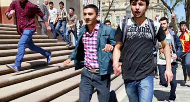 Participants of the rally in memory of victims of mass murder in Oil Academy which was dismissed by the police. Baku, April 30, 2013. Photo by Aziz Karimov.