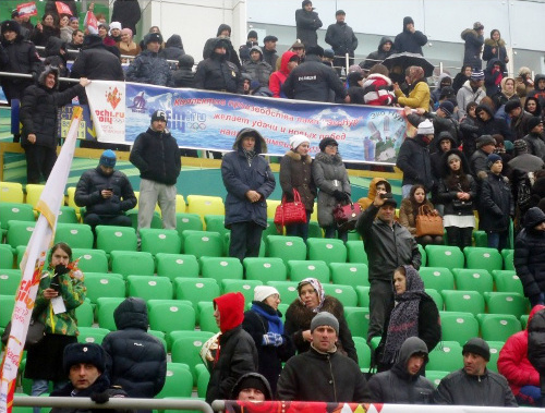 Spectators in the stalls of of the "Anji Arena" during the ceremony of honouring the Olympic Flame. Dagestan, January 27, 2014. Photo http://www.anji-arena.ru/olimpijskij-ogon-na-anzhi-arene/