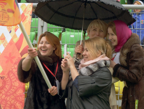 Spectators at the welcoming ceremony of the Olympic Flame at the "Anji Arena" Stadium. Dagestan, Kaspiysk, January 27, 2014. Photo by Timur Isaev for the "Caucasian Knot"