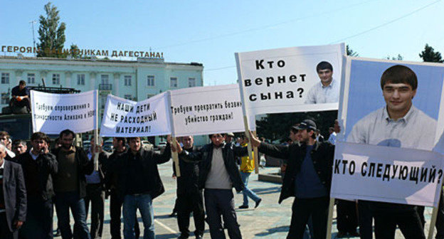 Protest rally against Alikhan Dinov's murder. Posters: "Who's next?" and "Who'll return my son?" September 30, 2009. Photo of "Caucasian Knot" Protest rally against Alikhan Dinov's murder. Posters: "Who's next?" and "Who'll return my son?" September 30, 2009. Photo of "Caucasian Knot"