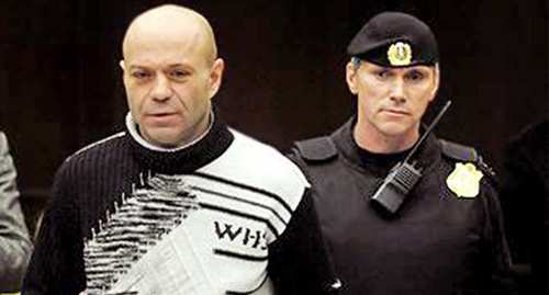 Dmitry Pavlyuchenkov (to the left) in the courtroom. Photo: AFP, http://www.svoboda.org/content/article/25432938.html 