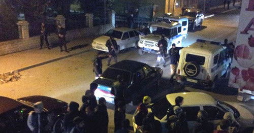 Relatives of Nadir Abu Khalid and community representatives gather near the Kirov ROVD. Makhachkala, October 8, 2014. Photo: Abu Zarr Adzhiev