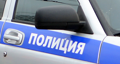 Inscription "Police" on a body of the police car. Photo by Oleg Pchelov for the "Caucasian Knot"