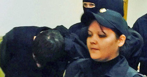 Zaur Dadaev is led through the corridor of the Basmanny Court of Moscow. March 8, 2015. Photo by the "Caucasian Knot"correspondent