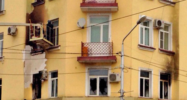 The building where the office of the Joint Mobile Group of the Committee against Torture (CaT) is located, after the fire. Grozny, December 14, 2014. Photo by Akhmed Aldebirov for the ‘Caucasian Knot’.