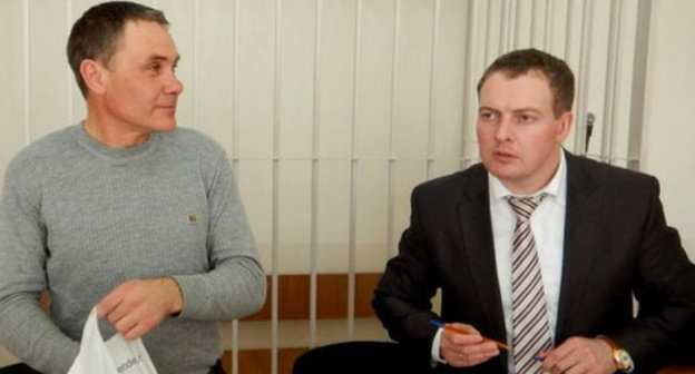 Evgeny Vitishko (left) and his advocate Sergey Loktev (right). Photo by Alexander Saveliev, http://ewnc.org/node/17701