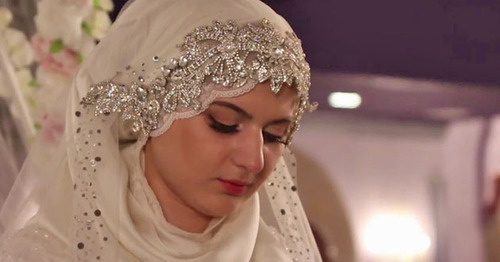 The wedding of the chief of the Nozhai-Yurt ROVD (District Interior Division) and a 17-year-old girl. Grozny, May 16, 2015. Screenshot of a video by the user Caucasian Policy https://www.youtube.com/watch?v=2xpRgf28g90