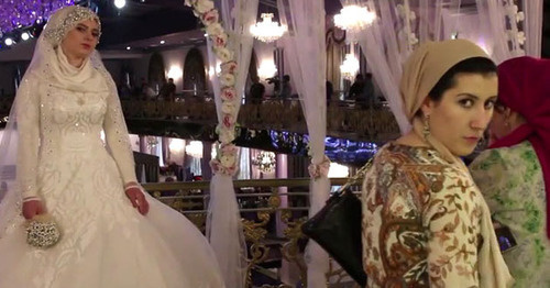 Wedding of the chief of the ROVD of the Nozhai-Yurt District of Chechnya with a 17-year-old girl. Grozny, May 16, 2015. Screenshot of a video by the user Caucasian Policy https://www.youtube.com/watch?v=2xpRgf28g90