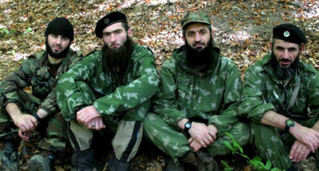 Aslambek Vadalov (second from the right), one of the leaders of "Imarat Kavkaz" which is recognized as a terrorist organization. Photo from a website of "Imarat Kavkaz", recognized as a terrorist organization. 