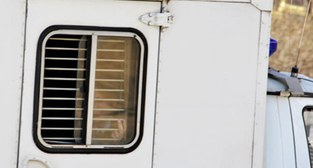 Members of BORN in the paddywagon. Photo by Magomed Tuaev for the "Caucasian Knot"