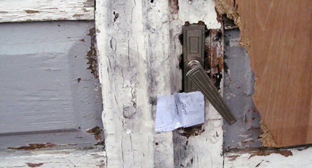 Door of the house belonged to massacred Avetisyan family, Gyumri, January 2015. Photo by Tigran Petrosyan for the ‘Caucasian Knot’. 