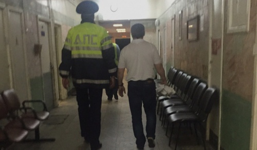 Khadjimurat Temurziev is led to the courtroom. Moscow, August 28, 2015. Photo by Mikail Kostoev for the "Caucasian Knot"