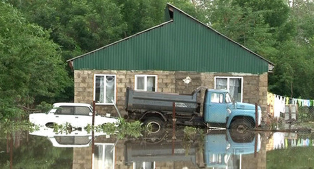 A house affected by flooding. Adygea, May 25, 2015. Photo https://mvd.ru/news/item/1060861/