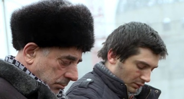 Suleiman Gazaliev and his son Said-Emin at the public condemnation in the square of Shali. January 15, 2016. Photo: screenshot of the story shown by the Chechen TV Channel