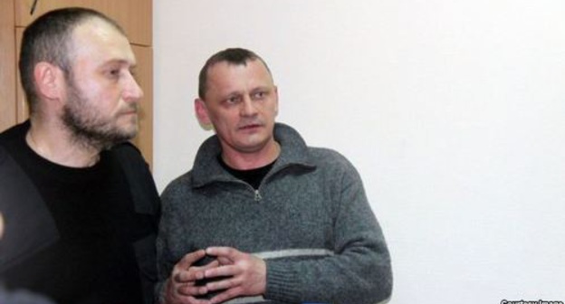 Nikolai Karpyuk and Stanislav Klykh in the courtroom. Photo: http://www.svoboda.org/content/article/27342893.html