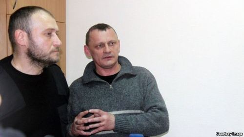 Nikolai Karpyuk and Stanislav Klykh in the courtroom. Photo: http://www.svoboda.org/content/article/27342893.html