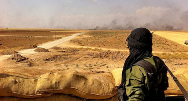 War in Syria. Photo: Kurdish YPG Fighter https://www.flickr.com