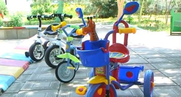 Bicycles in the playground of a social-rehabilitation centre for minors in Makhachkala. Photo: screenshot of a video about the centre publushed on YouTube