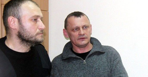 Nikolai Karpyuk (to the left) and Stanislav Klykh in the court. Photo: RFE/RL