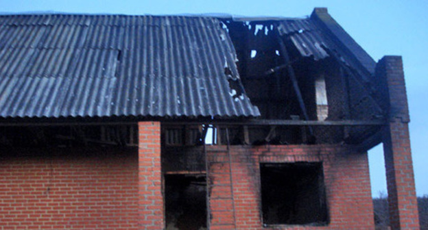 House of the relatives of the militants killed on December 4 in Grozny burned down in the village of Yandi, Achkhoi-Martan District, December 7 2014. Photo provided by the HRC ‘Memorial’ press-service.