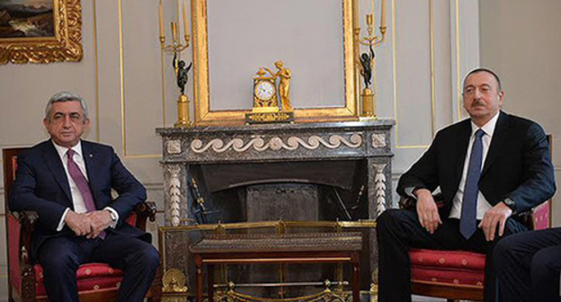 The meeting of Azerbaijani President Ilham Aliev and Armenian President Serzh Sargsyan. Photo: Sputnik Armenia http://sputnikarmenia.ru/armenia/20151219/1439998.html#ixzz48zAklhvx. Twitter/Vladimir Akopyan