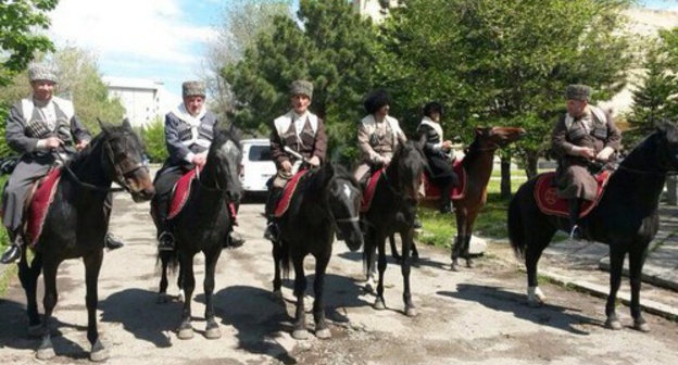Horsemen in national costumes. Photo by Kemal Urusov and Artur Boicharov for the ‘Caucasian Knot’.  