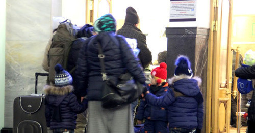 A family leaving Chechnya in a queue at passport control at Brest Centraĺny Railway Station. March 2016. Photo by Akhmed Aldebirov for the "Caucasian Knot"