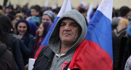A participant of the rally in Grozny, March 2015. Photo by Akhmed Aldebirov for the "Caucasian Knot"