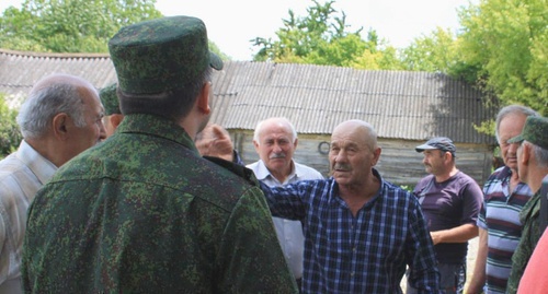 The participants of the protest rally in the village of Velit argue with the officials. Photo: KGB for South Ossetia, Facebook.com/komitetgosbezopasnosti.southossetia