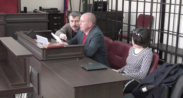 Valery Brinikh with his advocates in the court room. Photo http://01portal.com/?p=1118