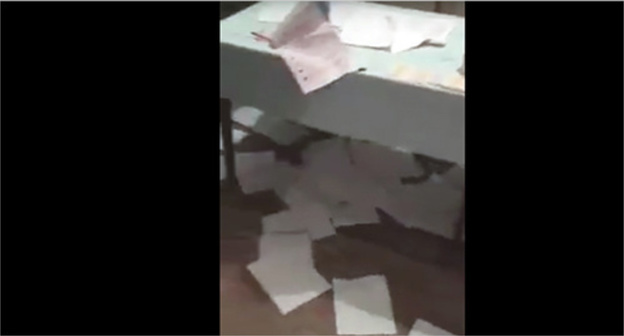 Trampled down ballot papers at the polling station in the village of Gotsatl. Screenshot of a video from the "Dagestan Online" community on Facebook, facebook.com/groups/dagonline