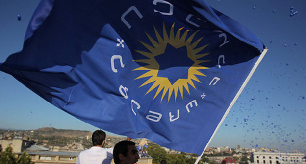 The flag of the "Georgian Dream - Democratic Georgia" Party. Photo: Sputnik/Mikhail Mokrushin