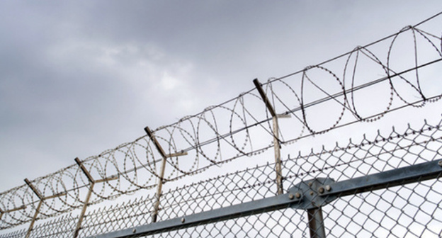A prison fence. Photo: Thinkstock/Fotobank.ru