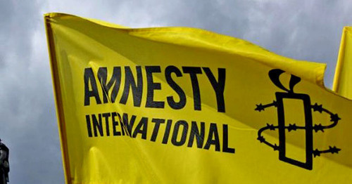 Flag with Amnesty International logo. Photo: http://haqqin.az/news/83912