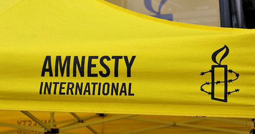 Logo of the international human rights organization "Amnesty International". Photo by the user Metropolico.org flickr.com Logo of the international human rights organization "Amnesty International". Photo by the user Metropolico.org flickr.com