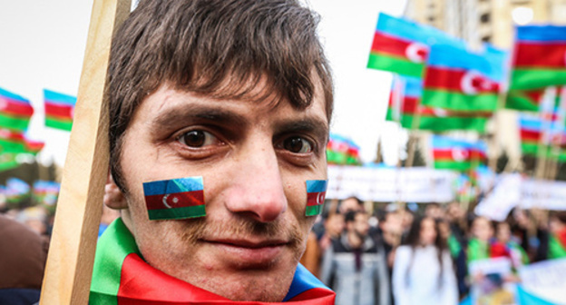 A participant of the protest action in Baku. Photo by Aziz Karimov for the "Caucasian Knot"