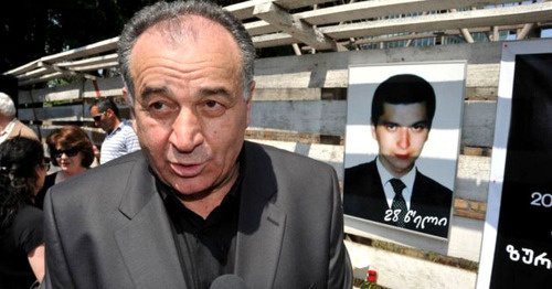 David Vazagashvili near the portrait of his son Zurab Vazagashvili. Photo: RFE/RL