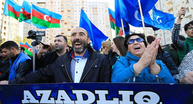The participants of the rally of  the "Musavat" Party in Baku. An inscription on a poster: "Freedom". October 25, 2015. Photo by Aziz Karimov for the "Caucasian Knot"
